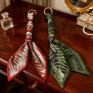 Elegant forest style floral printed scarf keychains with gold rings for luxury bags.