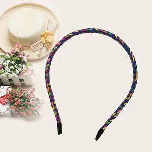 Close-up showing the intricate multi-color braided PU leather texture of this headband