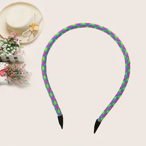 Detailed view of a vibrant colorful woven PU leather headband hair accessory for girls