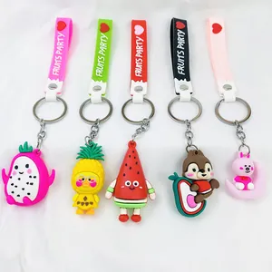 Cute PVC fruit character keychains with colorful wrist straps and charms