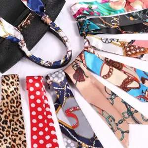 Selection of colorful skinny silk scarves for stylish handbag handle decoration