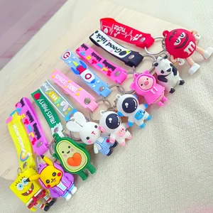 Detailed view of colorful cartoon character silicone keychains with wrist straps