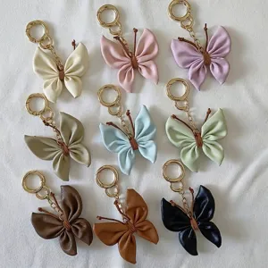 Set of 9 colorful butterfly keychains made of soft PU leather charms for car bags