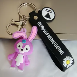 Cute purple cartoon rabbit silicone keychain with black strap and daisy flower charm