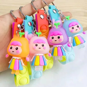 Portachiavi bambola arcobaleno colorata con cinturini pop-it in silicone
