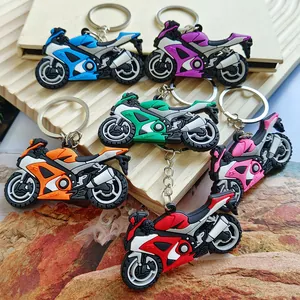 Detailed view of colorful motorcycle PVC keychains in various vibrant colors