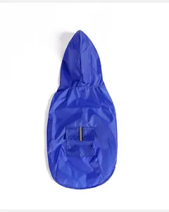 Back view of a blue waterproof dog raincoat with a hood and reflective safety strip