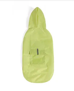Fluorescent green hooded dog raincoat detail showing waterproof fabric and reflective strip.