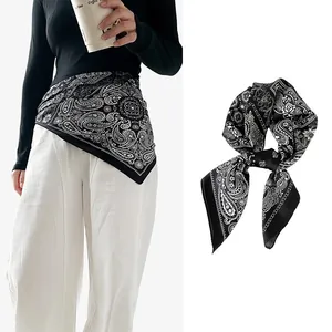 Elegant black and white paisley silk scarf used as a waist belt and decorative necktie