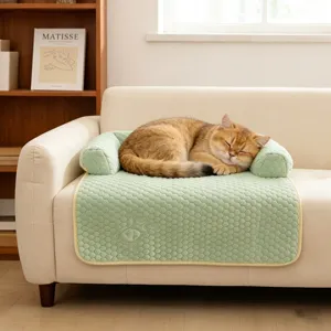 Protective pet sofa mat with headrest for cats and dogs in soft green