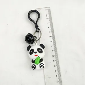 Size reference for the cute PVC panda keychain with a black bell and green leaf