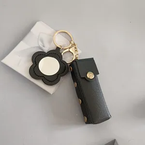 Élégant étui à rouge à lèvres en cuir noir avec porte-clés miroir fleur et boîte cadeau