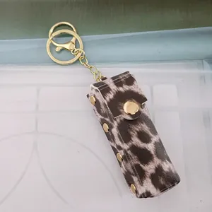 Stylish leopard print PU leather lipstick holder keychain with golden metal hardware