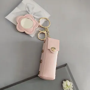 Porte-clés étui à rouge à lèvres en cuir rose avec miroir de maquillage en fleur