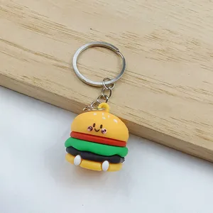 Cute smiling cartoon hamburger keychain detail showing multi-layered simulation food design