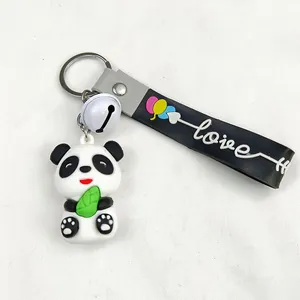 Close-up of cute cartoon panda keychain with PVC rubber pendant and love strap
