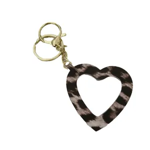 Porte-clés tendance en forme de cœur léopard avec miroir portable pour sac à main