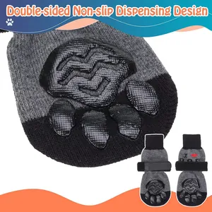 Macro detail of anti-slip rubber paw print on breathable cotton dog socks for grip