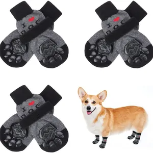 Anti-slip waterproof dog socks with adjustable straps for small to large dogs.