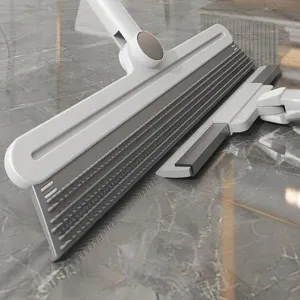 Multi-functional pet hair removal brush with extended scraper for floor cleaning