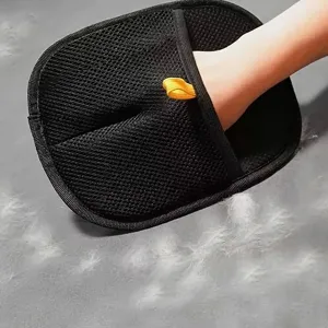 Durable black double-sided pet grooming glove for efficient cat and dog hair removal