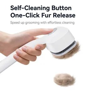 White pet grooming spray brush with one-click hair removal feature for cats and dogs