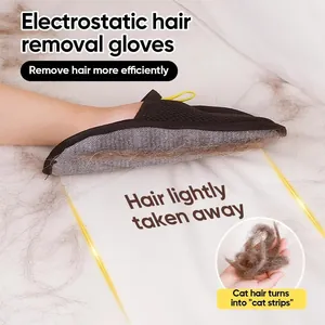 Efficient pet electrostatic hair removal glove gathering cat fur on white fabric surface
