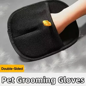 Detailed view of the mesh material and double-sided design of a pet grooming glove.
