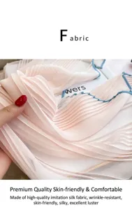 Close-up of a pink pleated silk-like scarf featuring a contrasting blue edge finish.