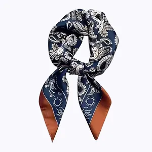Elegant navy blue paisley silk scarf with vintage sun motifs and brown borders