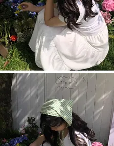 Bandana a quadretti verde chiaro stile francese indossata da una modella in giardino