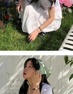 Primo piano di una ragazza che indossa un foulard a scacchi verde chiaro stile francese