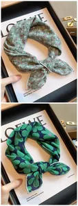 Close-up of floral and clover patterned cotton neckerchiefs shown in two distinct styles