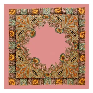 Detailed macro view of a pink satin square scarf with intricate paisley and floral print