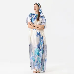 Full-body detail of elegant blue floral printed silk-like beach caftan with headwrap