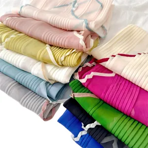 Elegant collection of colorful thin pleated silk scarves featuring contrast color stitched hems