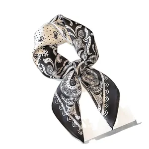 Elegant black and white paisley silk scarf for women in a minimalist old money style