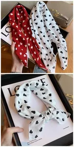 Detailed view of Harajuku style cotton square scarf with romantic heart patterns for women