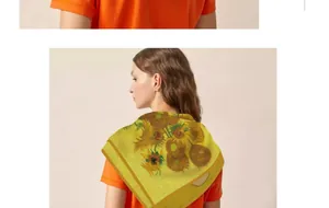 Detail shot of Van Gogh Sunflowers silk scarf draped over a model's shoulders in style.