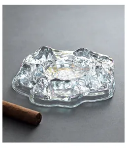 Close-up of a creative glacier-shaped glass ashtray with Fuji mountain design for cigars