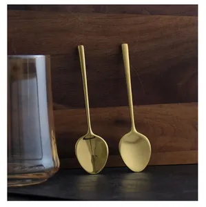 Close-up of elegant gold 304 stainless steel stirring spoons for coffee and dessert