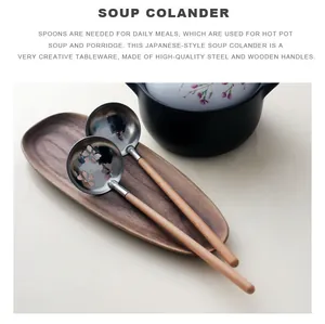 Detail of Japanese-style stainless steel soup spoons with elegant long wooden handles