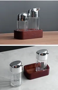 Nordic style seasoning set featuring a solid wood base and two acrylic condiment bottles