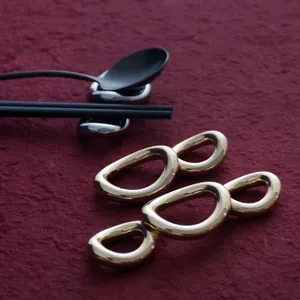Amerikaanse Stijl Legering Roestvrij Staal Stokjessteun Cirkel Ring Ontwerp Eettafel Decoratie Spiegelgepolijst Luxe Metalen Stokjeshouder Voor Banket Thuis