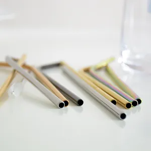 Premium reusable stainless steel straws set in various colors with a cleaning brush