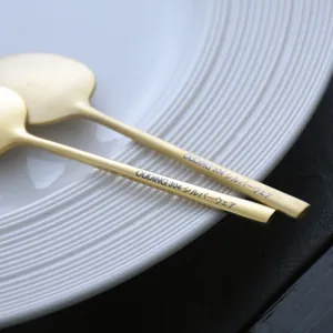 Elegant 304 stainless steel golden coffee spoon with engraved handle details