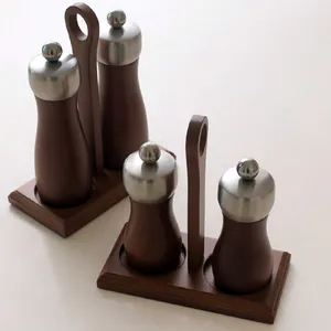 Manual wood pepper and salt grinder set with stainless steel top and wooden tray
