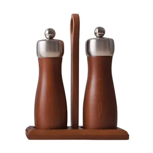 Manual wooden pepper and salt grinder set with stainless steel tops and a carrier stand