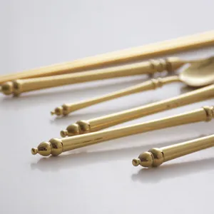 Elegant gold 304 stainless steel cutlery set featuring bamboo-inspired handle designs