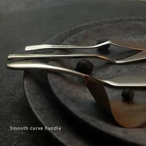 Modern stainless steel butter knife set featuring elegant ergonomic curved handles